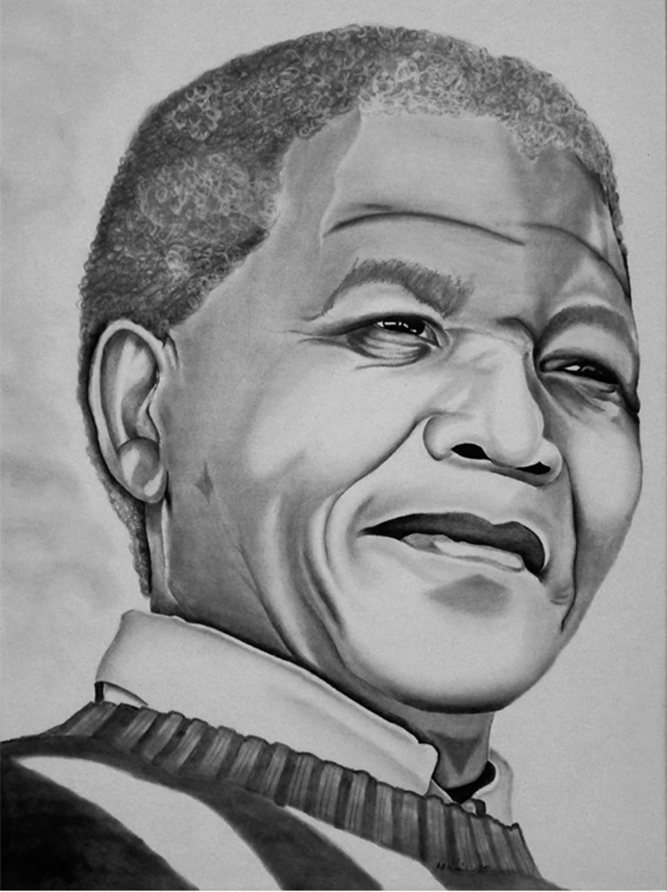 Graphite portrait of Nelson Mandela smiling and looking to the side